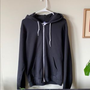 Black zip up hoodie.